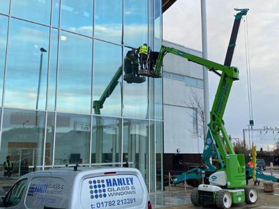 Safely replace damaged oversized double-glazed units at a Sixth Form College
