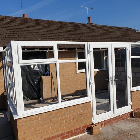 To build a new conservatory with a 'warm roof'