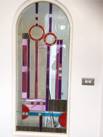 Design and installation of coloured glazing focal piece for domestic property.