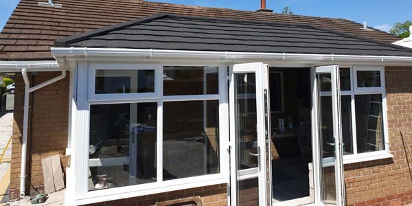 To build a new conservatory with a 'warm roof'